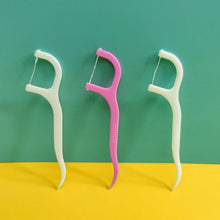 Convenient floss sticks for maintaining oral hygiene.